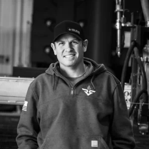 Black and White picture of RedRiver Team Member named "John Torres"