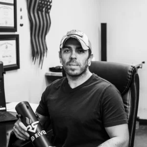 Black and White picture of RedRiver Team Member named "Vince Perez"