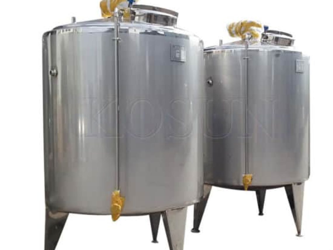 Two stainless steel tanks sitting side by side